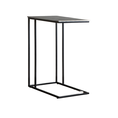Sofa table in aluminium beaten metal with black iron legs, made to slide under a sofa. Tables in this shape are perfect space savers and in this fabrication adding glamour to any room.