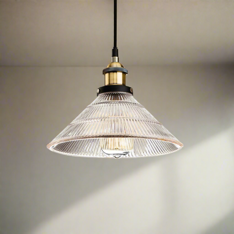 Antique Brass with Clear Fluted Glass pendant light. Perfect kitchen island light
