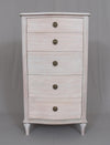 A beautiful five drawer tallboy of superior hardwood quality.&nbsp; This is a very pretty piece made from mahogany wood, finished in an soft white wash veneer finish. The off white finish has warm tones and it's matt, slightly weathered appearance results in a light and airy Skandi feel. Perfect for any living room or bedroom as its neutral finish allows it to blend seamlessly with different color schemes and other furniture styles.&nbsp;&nbsp; A timeless classic storage chest designed to give permanence to
