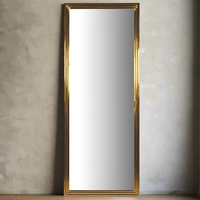 Gold metal framed stepped mirror. Luxurious polished metal frame makes this the ultimate statement mirror. The polished gilt of the metal frame adds to the splendour of this mirror and gives an overall glamourous effect.