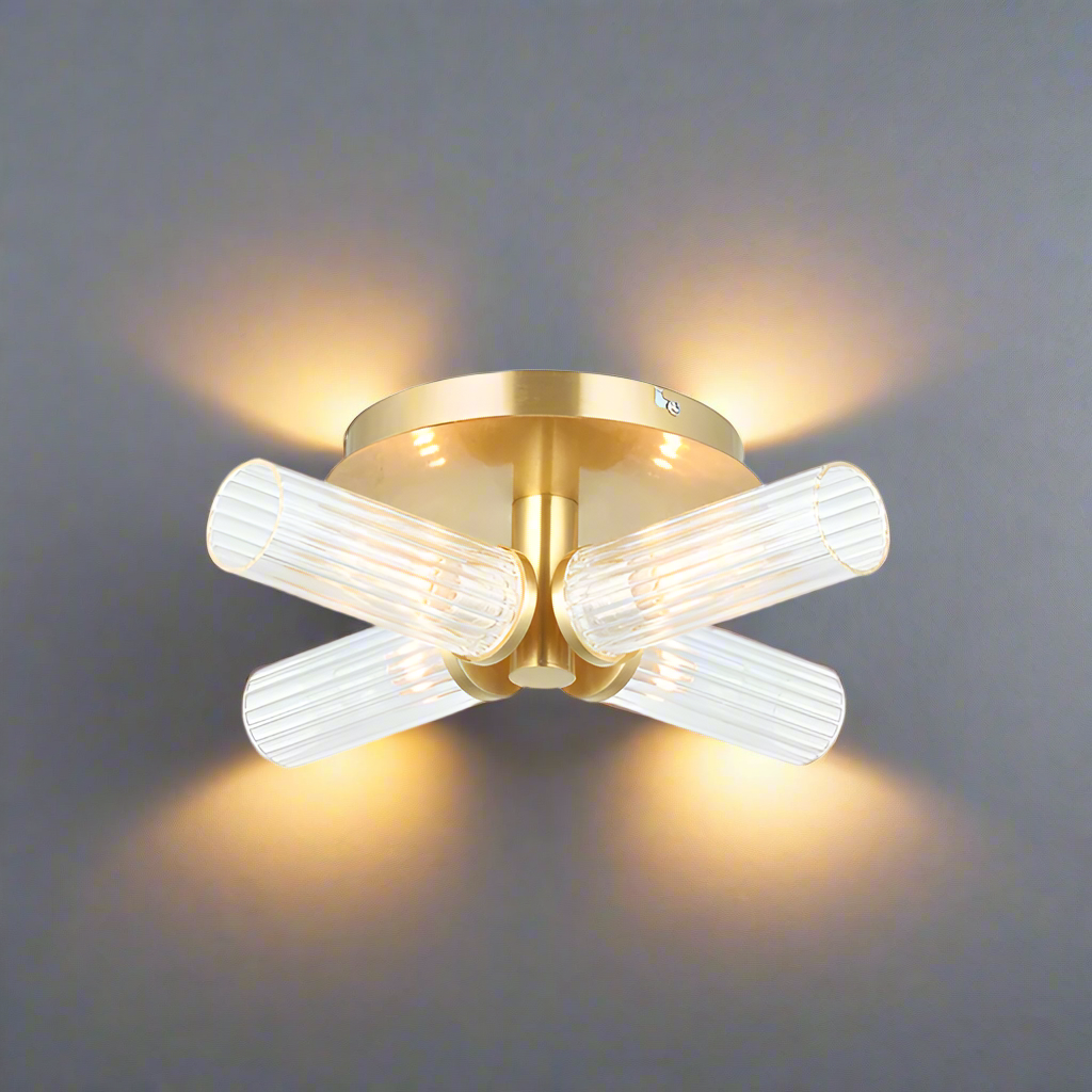 Four light semi-flush style; stunning brushed gold and clear ribbed glass light.
It has an IP44 rate, suitable for  bathroom use. Make your bathroom glamorous!