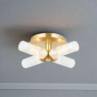Four light semi-flush style; stunning brushed gold and clear ribbed glass light.
It has an IP44 rate, suitable for a&nbsp; bathroom use. Make your bathroom glamorous! Can also be used as a wall light.