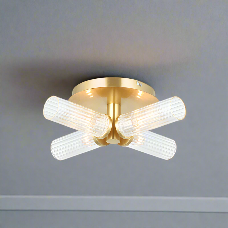 Four light semi-flush style; stunning brushed gold and clear ribbed glass light.
It has an IP44 rate, suitable for a&nbsp; bathroom use. Make your bathroom glamorous! Can also be used as a wall light.
