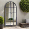 Window mirror in an antique grey metal finish with 2 doors latched in the front of the mirror.
Arched window mirrors, classic garden mirrors adding the illusion of light and space to the wall of any room.