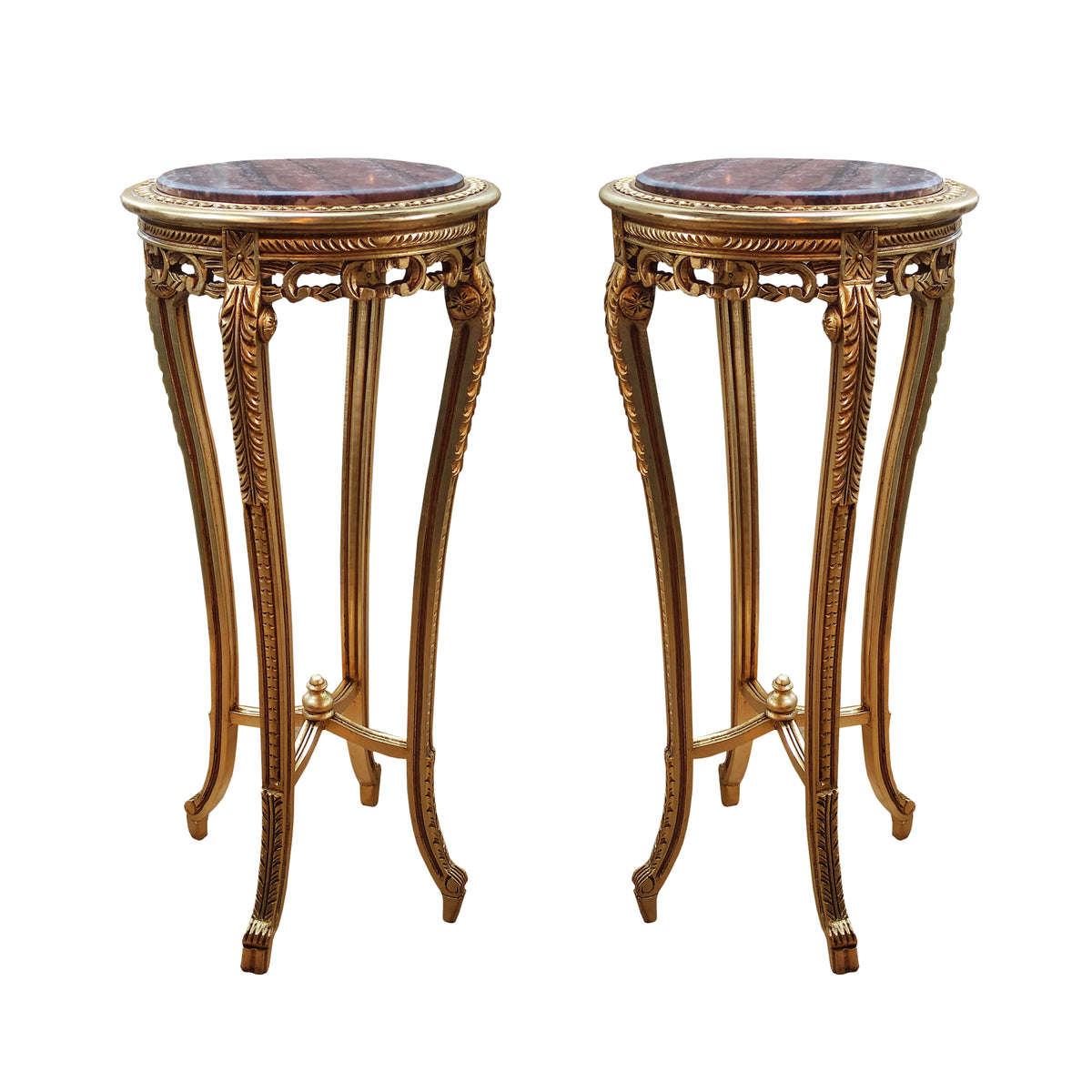Ornate curved gilt wood based stand with marble top in a Louis style.&nbsp; The base is richly carved and covered in gold, the veined red marble is inset into the top of the stand.&nbsp; The stand has four slender cabriole legs, fluted and carved with acanthus leaves and classical motifs. The legs are then connected with a gilt stretcher to add stability. These stands are used to display a highly decorative work of art or can be used as plant stands. They will lift any room in which they are placed and work