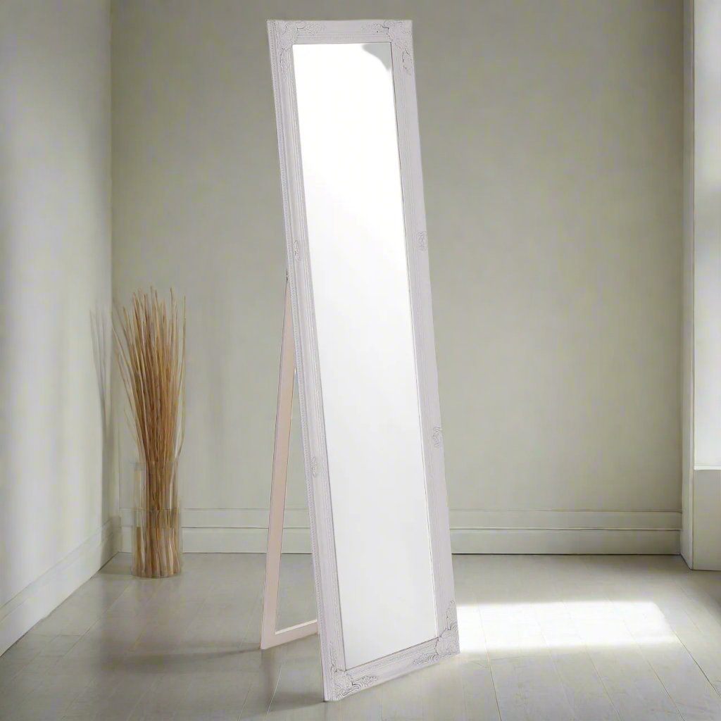 Tall white wooden mirror with stand , great to use in the centre of a bedroom to check your appearance and then close the stand back and lean the mirror on the wall.&nbsp; Definitley a bedroom cheval mirror - what everyone needs in a full length mirror and the white painted finish will fit into most interiors.


H: 160 cm W: 40 cm D: 3 cm