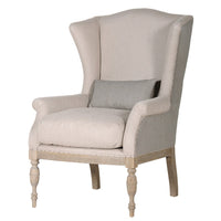 A very pared back, light coloured wing chair sitting on tapered, turned legs.&nbsp; The reverse of the chair is upholstered in a pale striped linen styled fabric with a cushion to the seat in the same stripe.&nbsp; A very neutral chair that would work well in the most minimalist of rooms or as a country house chair.&nbsp; In a living room or bedroom this chair would work beautifully.&nbsp;
