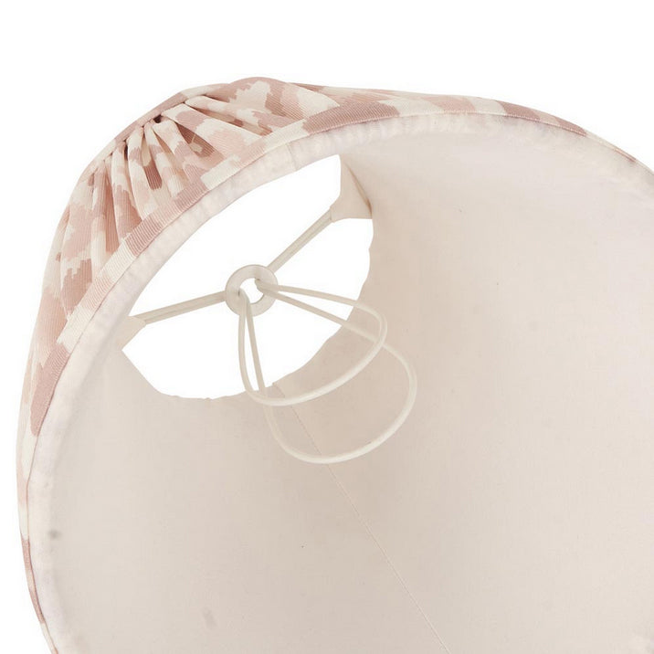 16cm tapered shade with a clip to fit golf or candle bulbs. Unique Ikat pattern design in taupe with taped edge detailing.
Perfect when paired with decorative table lights, wall lights or chandeliers.