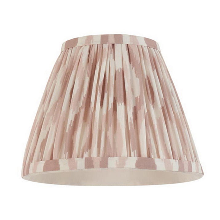 16cm tapered shade with a clip to fit golf or candle bulbs. Unique Ikat pattern design in taupe with taped edge detailing.
Perfect when paired with decorative table lights, wall lights or chandeliers.