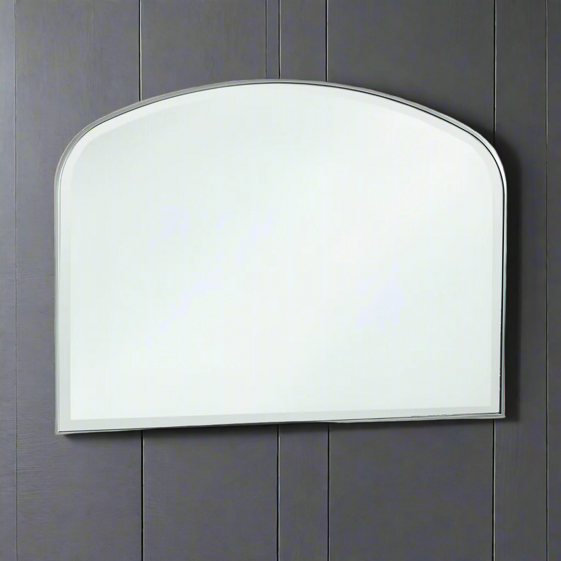 Slim framed overmantle mirror in silver. A minimalist mirror in a typical overmantle shape, in a contemporary setting this mirror could sit over a fireplace or console table.