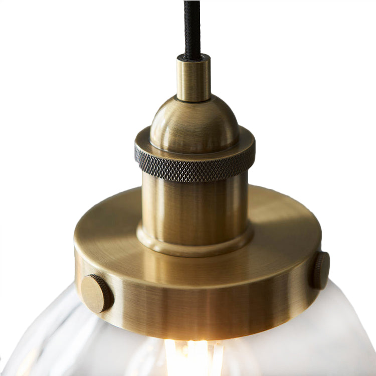 3 light, linear pendant in clear glass with antique brass metal accents and ceiling plate. To add light over your kitchen island or dining area. A real design led addition to your dining room or kitchen.