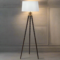 A stunning tripod base with a wooden spindle design to the base.&nbsp; This lamp has a superb design element making it exceptionally stylish.&nbsp; Elegant twisted slender tapered legs with a stunning brass finish elevates this floor lamp to a totally different dimension.


H: 160 cm Dia: 52 cm