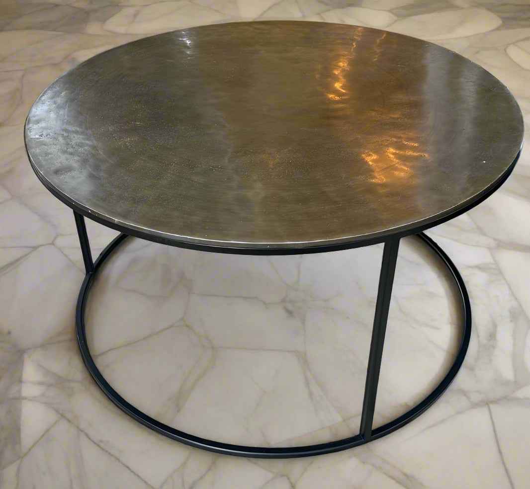 This  low coffee table would look amazing in an industrial setting especially as the aged metal reflects light which adds a warm rich golden tone.