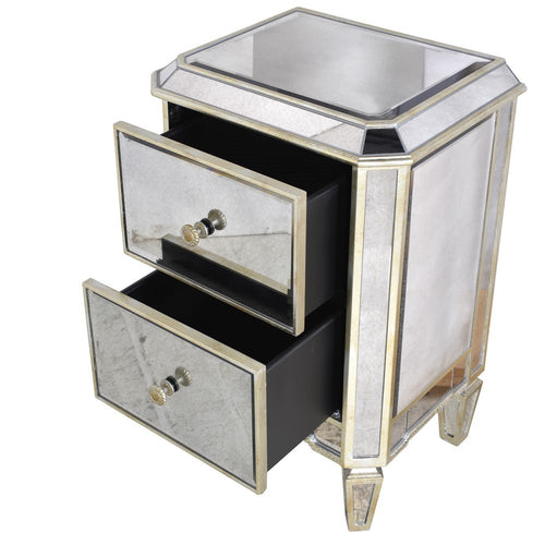 <p>This mirrored bedside table with two draws comes with small metal handles and ample storage.&nbsp; It has very clean simple lines and will make your bedroom feel more glamorous and spacious.</p> <p>H: 73 cm W: 46 cm D: 37 cm</p>