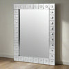 This is a Venetian-style wall mirror featuring a striking raised decorative frame. The rectangular mirror is bordered by a geometric design of square mirrored tiles, each accented with a raised circular dome detail that adds dimension, texture, and light-catching elegance. The reflective frame enhances the mirror’s brilliance, making it not only functional but also a bold decorative statement.

Its clean lines and sculptural frame give it a contemporary twist on classic Venetian design, making it versatile 