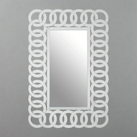 Decorative, all glass mirror with a glass ring decor to the frame Very particular style of mirror with an art deco feel.&nbsp; A stunning statement piece which will flash light out from any wall, whether in the bedroom, dressing room or hall.