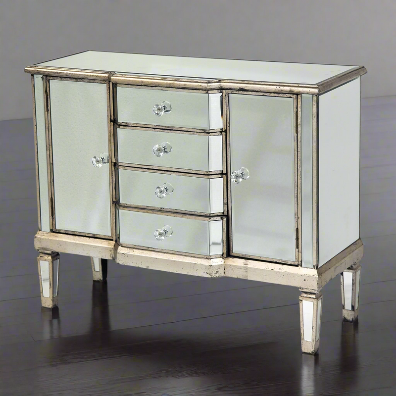 Venetian glass sideboard, cabinet with 2 doors and 4 drawers, the beauty of this type of furniture is that it just adds light to any room. Perfect bedroom or sitting room piece. Aged venetian glass with a champagne coloured wooden trim.