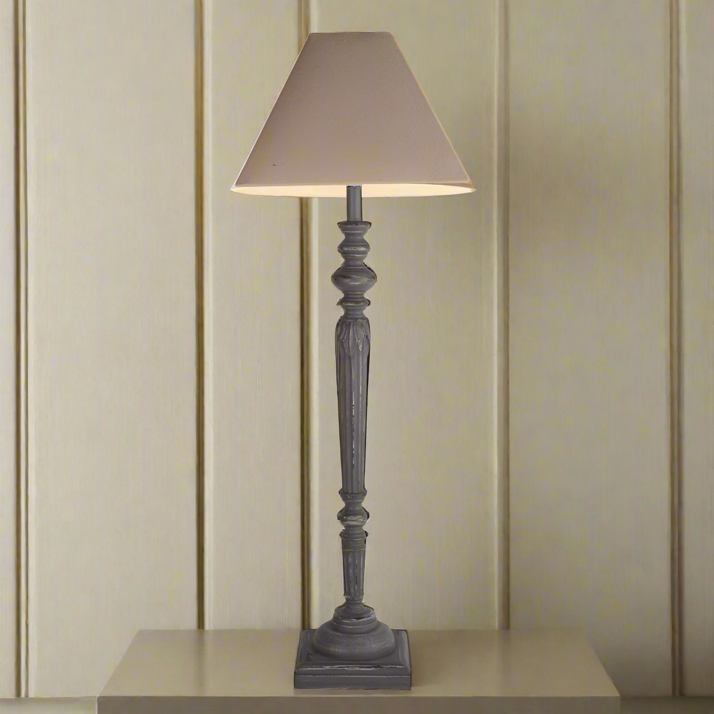 


H: 78 cm W: 16 cmExceptionally tall, grey, wooden table lamp with taupe shade, great bedside or side table lamp. The height of this lamp will help to spread light in any room.&nbsp; The colour of the base of this light works perfectly with the taupe linen shade, slim enough for the naroowest of bedside tables yet tall enough to throw light out into the room.&nbsp; Wooden lampbases fit into any aesthetic farmhouse, bohemian or just a classic period home adding, warmth, light and a wlecoming glow to your r