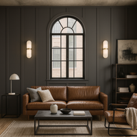 A pale coloured alabaster wall light in an 'art deco' shape with a gilt central band.&nbsp; At 40 cm long, this is a substantial light and would look perfect on a living room wall to add an 'art deco' aesthetic to the room.&nbsp; Wall lights are a fantastic way to add subtle lighting to your room and these alabaster lights are both decorative and effective.
