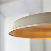 pendant light with a white dome detail