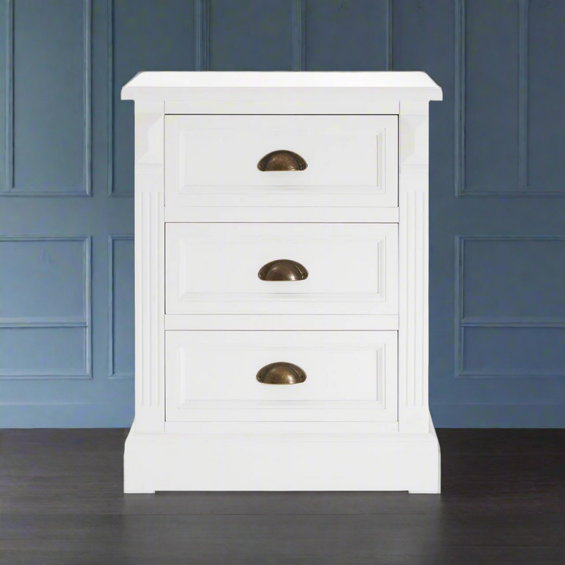 A compact 3 drawer, white finish bedside table with metal cup handles.&nbsp; Almost a chest of drawers this versatile piece of furniture offers great storage in your bedroom.


H: 66 cm W: 52 cm D: 37 cm