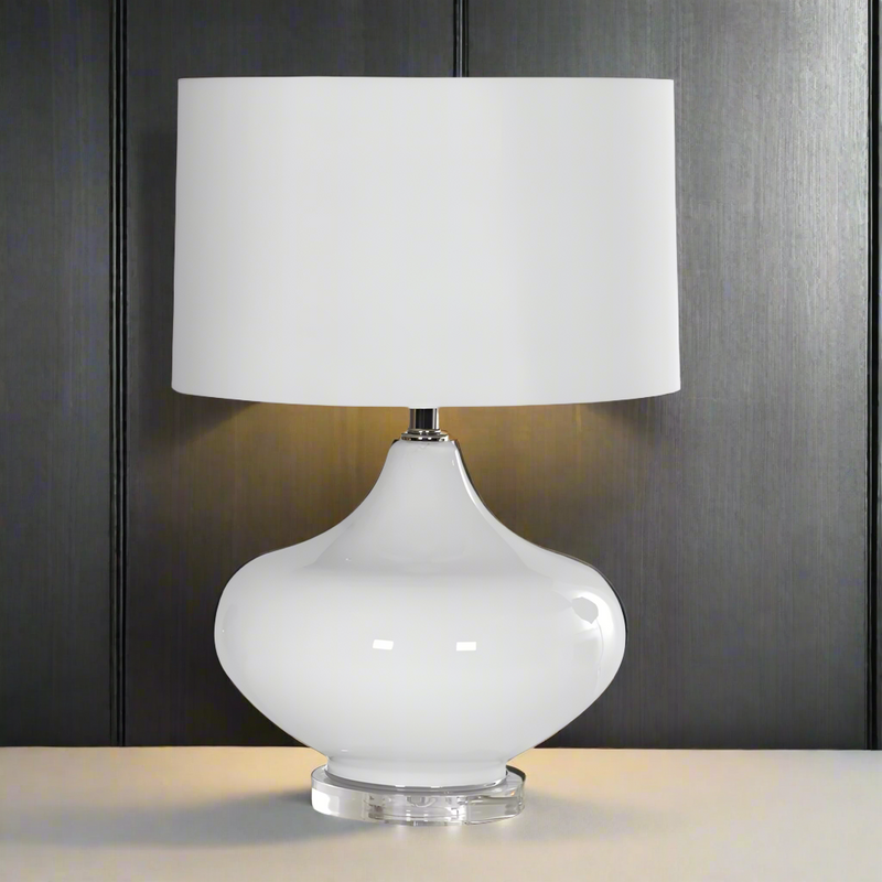 A large white glass lamp base and shade, for the most neutral decor, these lamps would be perfect. These shorter lamps would fit perfectly in a smaller space.&nbsp;