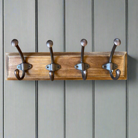 Bring practical storage to your hallway, entryway or bedroom with this rustic wooden wall-mounted coat rack. Crafted from solid wood and fitted with four durable black metal double hooks, it offers ample space for coats, jackets, hats, scarves, bags, and everyday essentials.