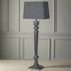 Extra tall grey wooden lamp base with simple grey linen shade,&nbsp; lamps of this height tend to spread so much light in a room, with a simple shade it would fit neatly against a wall, perfect bedside light.