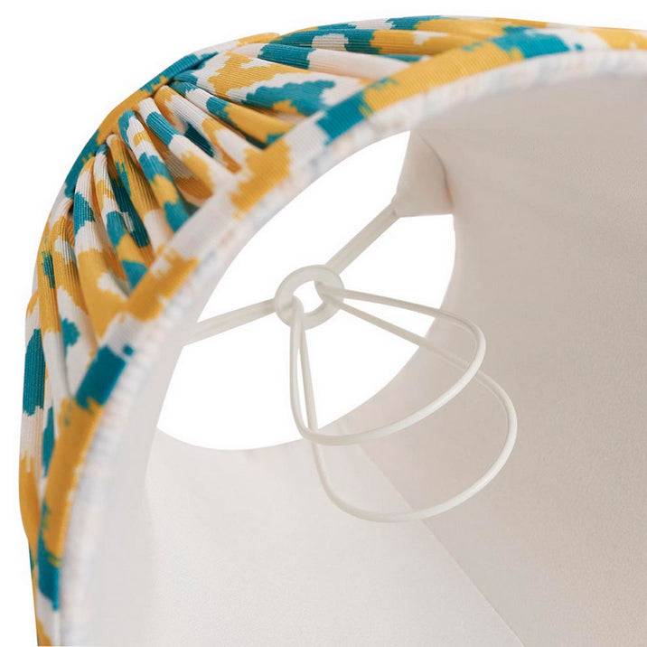 16cm tapered shade with a clip to fit golf or candle bulbs. Unique Ikat pattern design in yellow and green with taped edge detailing.
Perfect when paired with decorative table lights, wall lights or chandeliers.