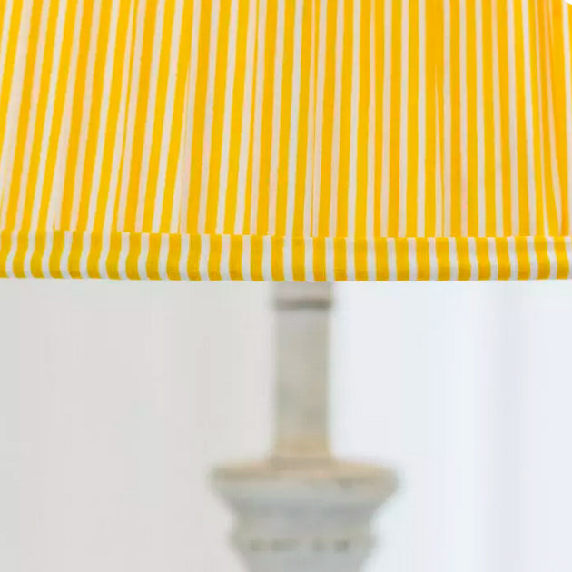 Striped yellow & white cotton shade.This lampshade is perfectly suited for most small to medium lamp bases, making it a versatile choice for living rooms or bedrooms. 