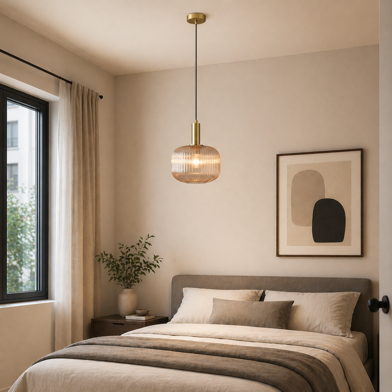 Modern bedroom with a bed, pendant light, and wall art.