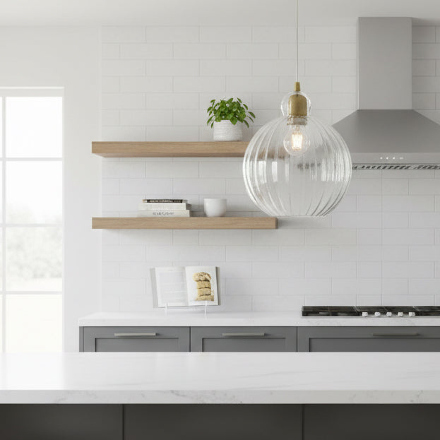 A round ribbed glass pendant light with antique brass metalwork. A pretty, round ribbed shape which would work well in a kitchen, cloakroom or even in a bedroom. 