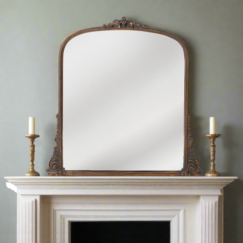 A totally classically shaped overmantle, perfect for a period interior. It has a dark finish with a minimal gold fleck running through,&nbsp; a large size to add light and perspective to any room.&nbsp; The right shape, colour and finish for a period home and fireplace.


Can be viewed in the Chiswick store with a range of other over mantle mirrors.&nbsp; Mirrors in West London.