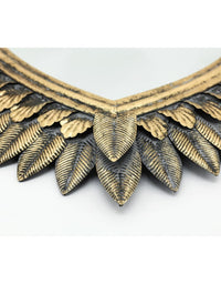 Decorative large gold heart wall mirror with winged feathered frame. 