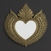 Decorative large gold heart wall mirror with winged feathered frame. 