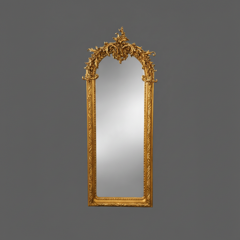 Baroque gold full-length wall mirror with ornate carved frame and arched top