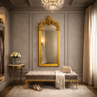 Ornate mirror in a luxurious bedroom setting.