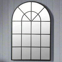 Black arched metal window mirror