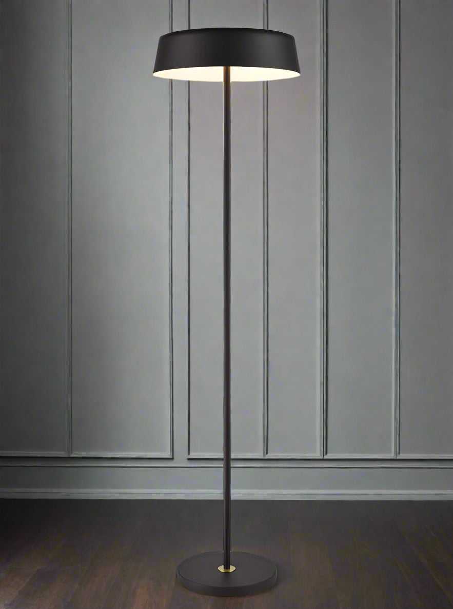 Black metal floor lamp with aged brass accents, 152cm high, with minimalist white inner shade. 