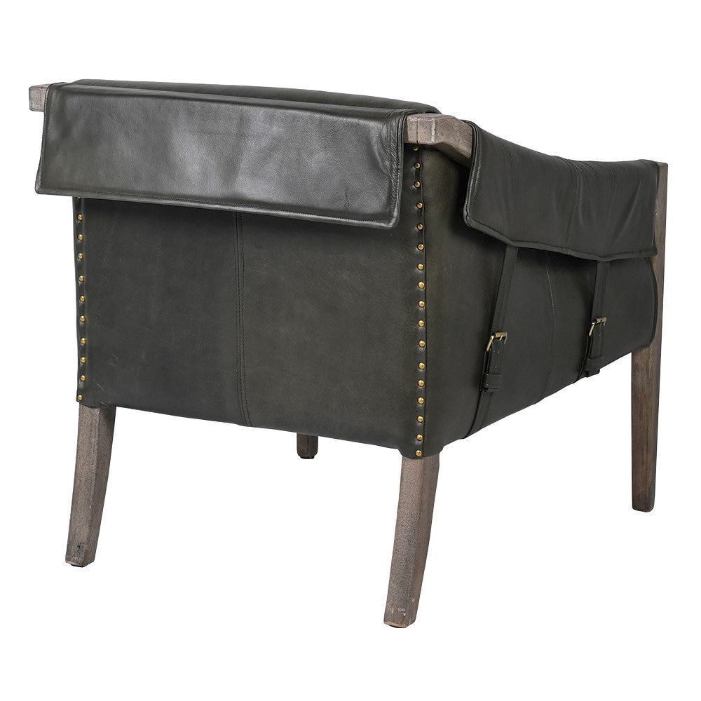 Vintage style leather armchair with two straps to each side.&nbsp;&nbsp; A mid-century style with low slung back on a mango wood frame. A contemporary design perfect in a modern interior in a dark vintage style leather. The addition of antique brass studs to the reverse of the chair and brass metal accents to the straps all add to the vintage feel of this luxury chair.

H: 75 cm&nbsp; W: 72 cm D: 83 cm 