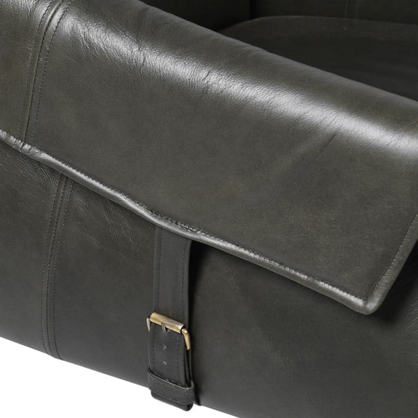 Vintage style leather armchair with two straps to each side.&nbsp;&nbsp; A mid-century style with low slung back on a mango wood frame. A contemporary design perfect in a modern interior in a dark vintage style leather. The addition of antique brass studs to the reverse of the chair and brass metal accents to the straps all add to the vintage feel of this luxury chair.