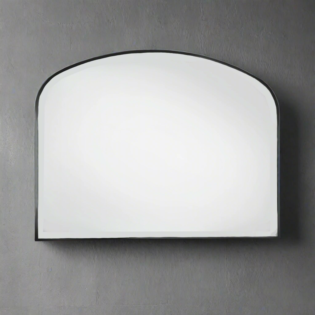 A rectangular black framed overmantle mirror mounted on a wall.