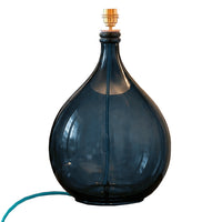 Blue glass lamp on a white background with E27 brass fitting and blue flex.