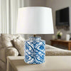 Beautifully classic blue and white ceramic lamp base and white shade. A petite version of the larger lamps, so pretty in a bedroom, sitting room - any room !!!!&nbsp; Blue and white ceramic lamps have been a staple of every English country house for many years, you can now use them in your period town home to add a touch of luxury to your decor. This particular light is the perfect size for a regular size home and the white linen shade throw light into your space.