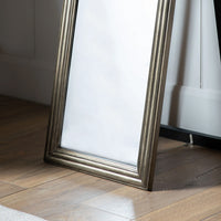 Free-standing stand of brushed brass cheval mirror