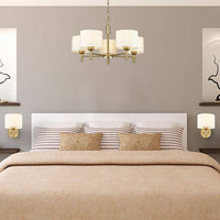 A neat, elegant shaded chandelier with 5 lights on a stunning brushed gold frame. A stylish gilt chain attached to the frame can be removed to turn this pendant into a flush light as in attached image.