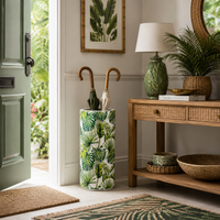Tropical ceramic umbrella stand in a cottage style hallway, near a garden. 
