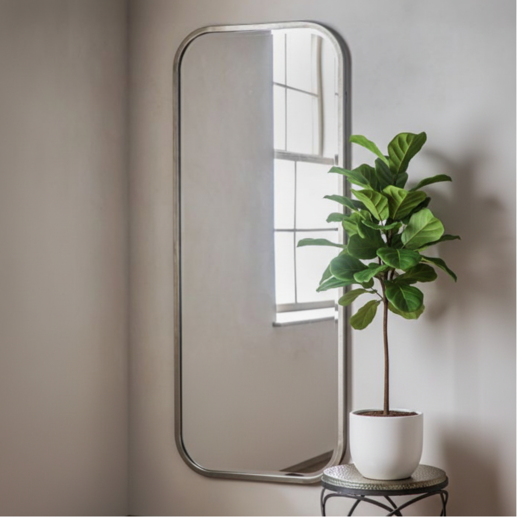 Champagne gold full length mirror in a living room