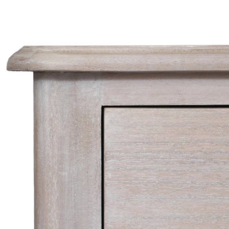Close-up of a soft off white wooden 6 drawer chest corner showing smooth finish and subtle grain, ideal for bedroom storage - SKU: DXIL1014