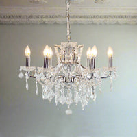 Shallow chrome 6-branch crystal chandelier with crystal droplets.